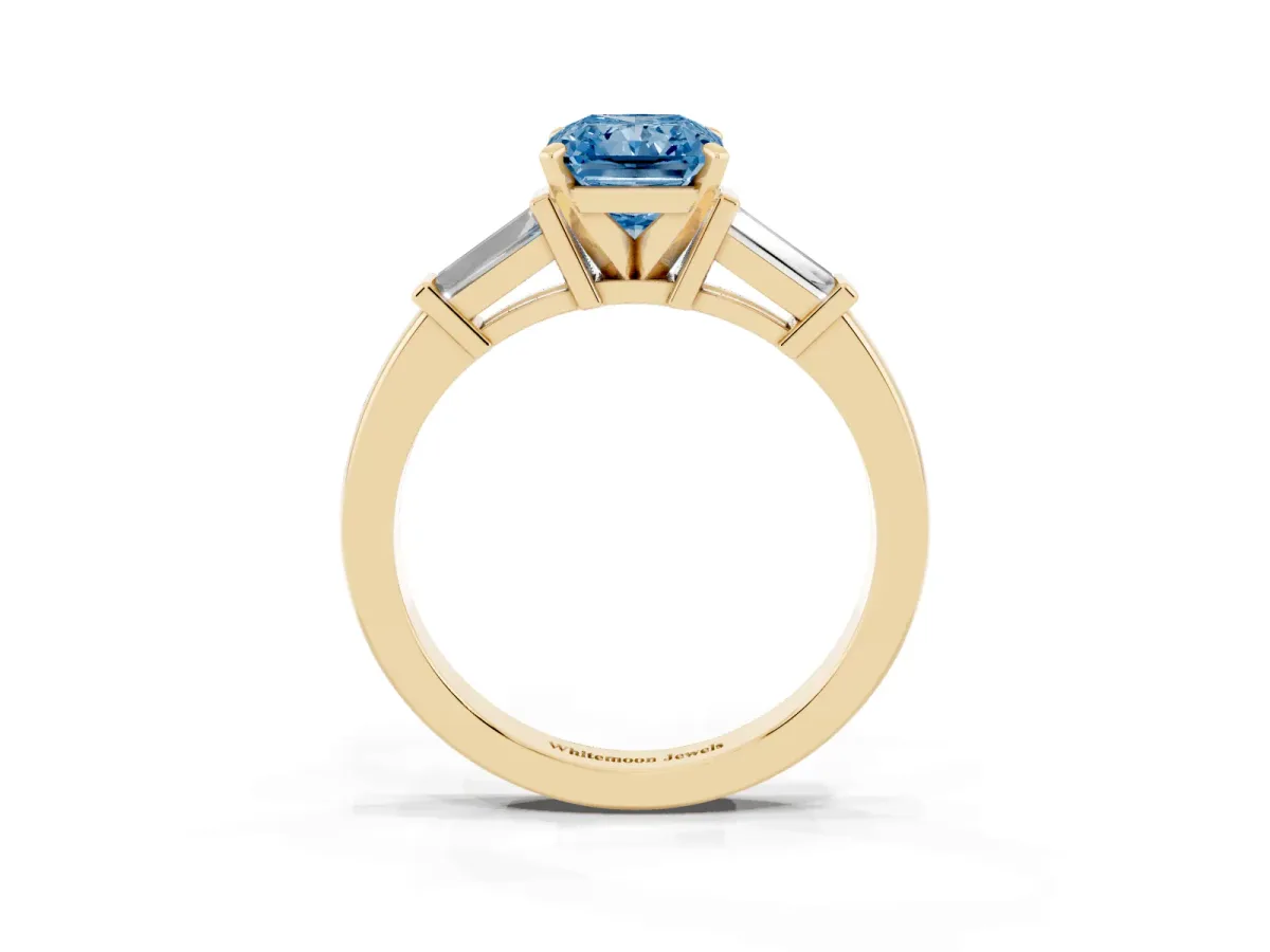 Fancy Blue Radiant Cut Cut Diamond Solitaire Ring with Tapered Baguette Accents and Four-Prong Setting Yellow gold