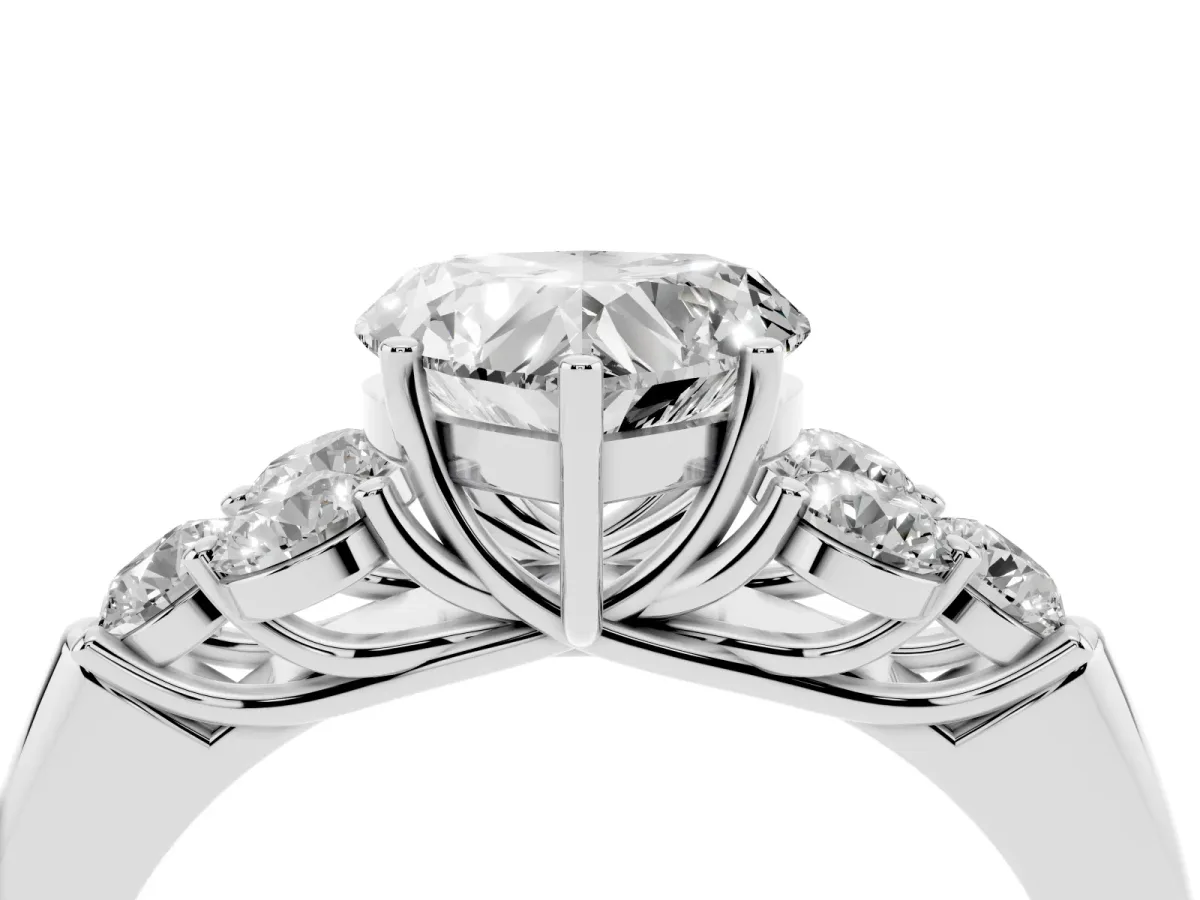 Heart Cut Cut Diamond Cluster Ring with Round Accent Stones and Prong Setting on a Classic Band White gold