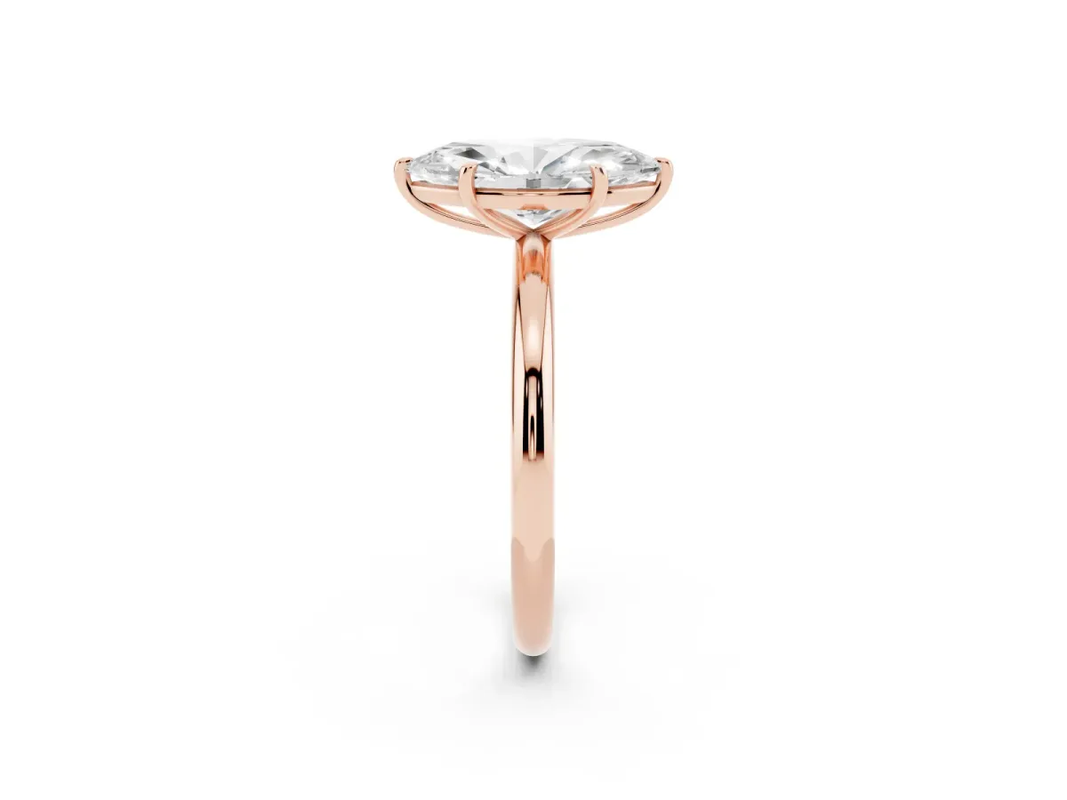 Marquise Cut Solitaire Diamond Ring with Four-Prong Setting on a Plain Band Rose gold