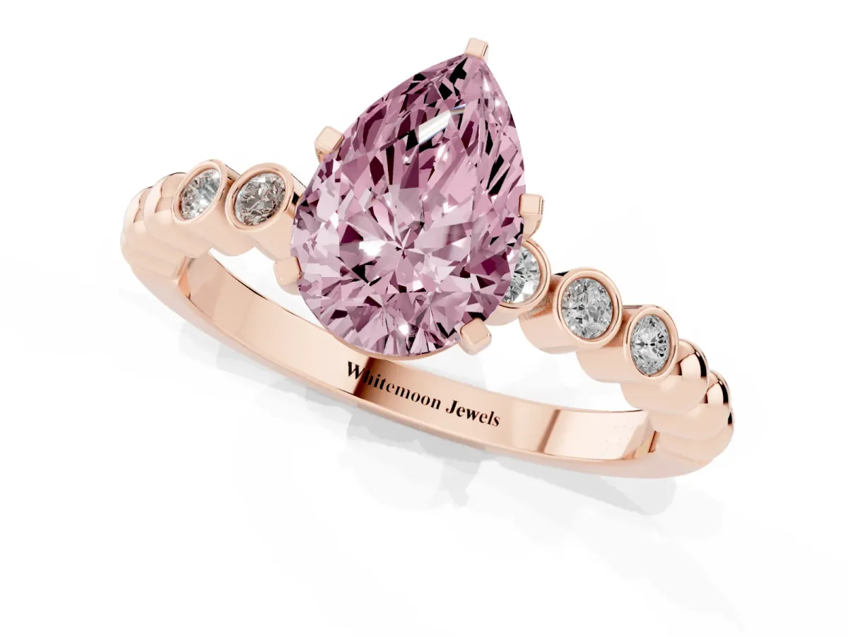 Fancy Pink Pear Cut Solitaire Bezel Accent Diamond Engagement Ring with Beaded Band and Four-Prong Setting Rose gold