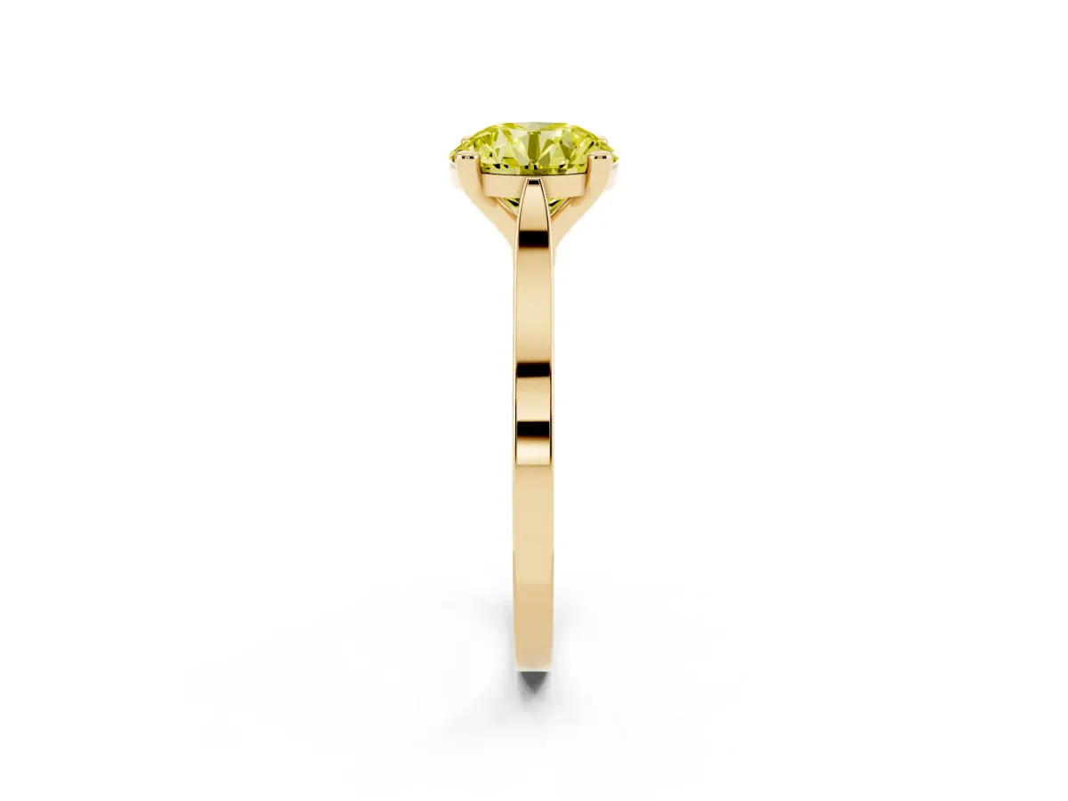 Fancy Yellow Round Cut Solitaire Diamond Ring with Four-Prong Setting and Tapered Band Yellow gold