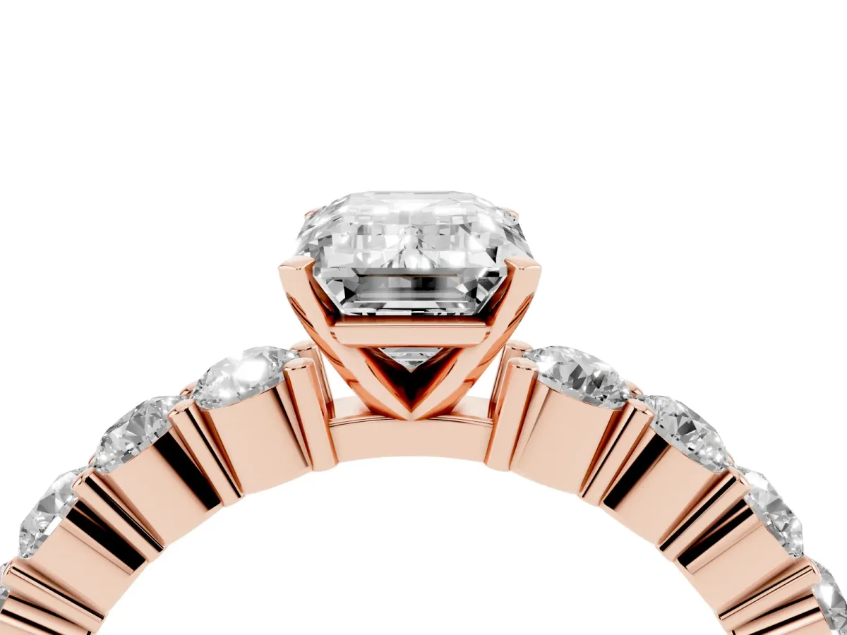 Emerald Cut Diamond Solitaire Ring with Shared Prong Round Side Stones Rose gold