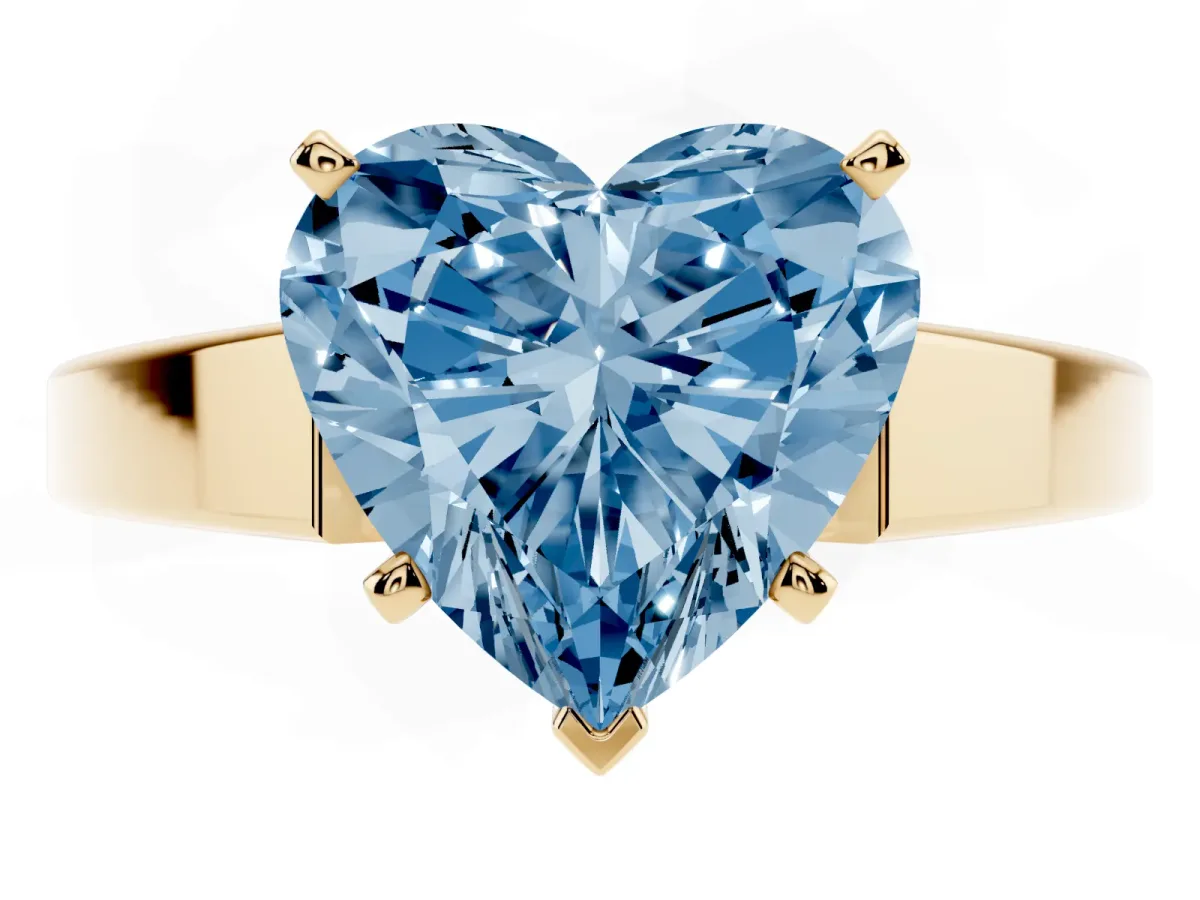 Fancy Blue Heart Cut Solitaire Engagement Ring with Four-Prong Setting and Tapered Band Yellow gold