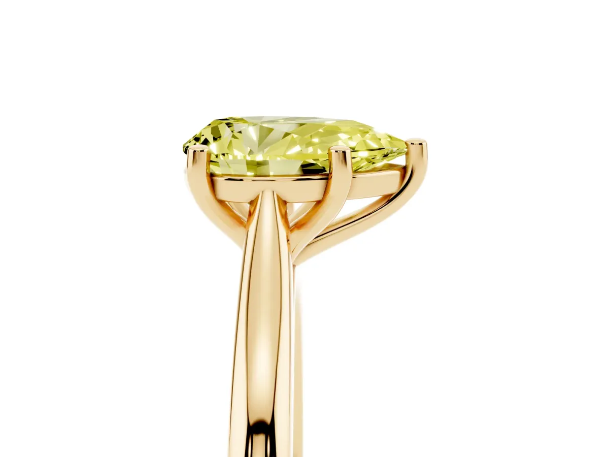 Fancy Yellow Pear Cut Cut Solitaire Ring with Cathedral Band and Four-Prong Setting Yellow gold