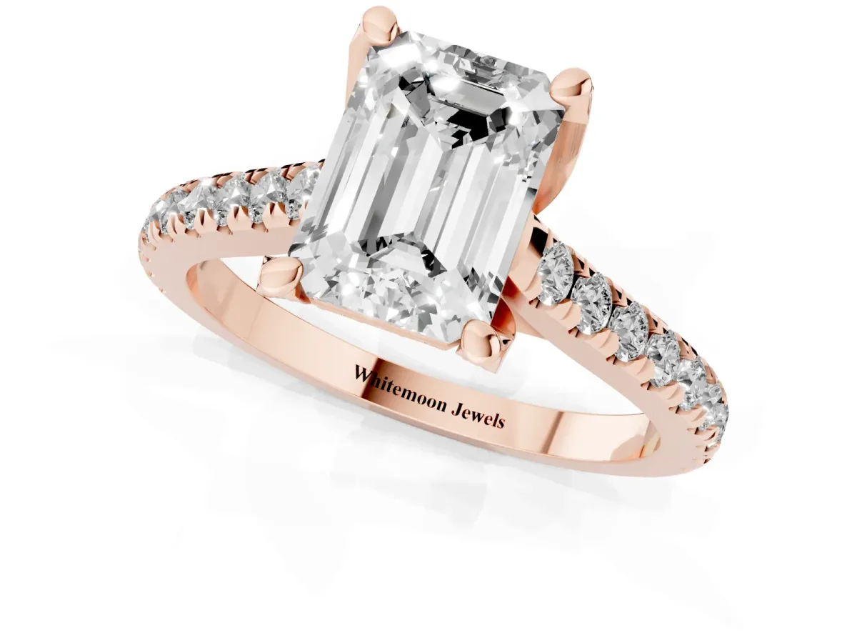 Emerald Cut Brilliant Diamond Solitaire with Pavé Band and Four-Prong Setting Rose gold