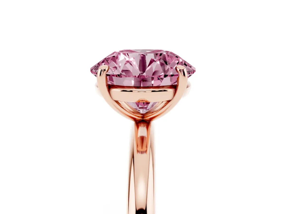 Fancy Pink Round Cut Solitaire Diamond Ring with Four-Prong Setting on a Plain Band Rose gold