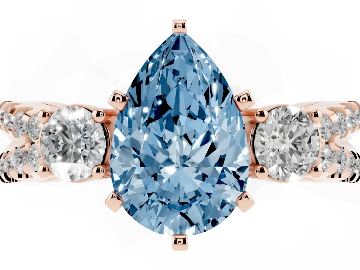 Fancy Blue Pear Cut Diamond Three-Stone Ring with Pavé Split Shank and Four-Prong Setting Rose gold