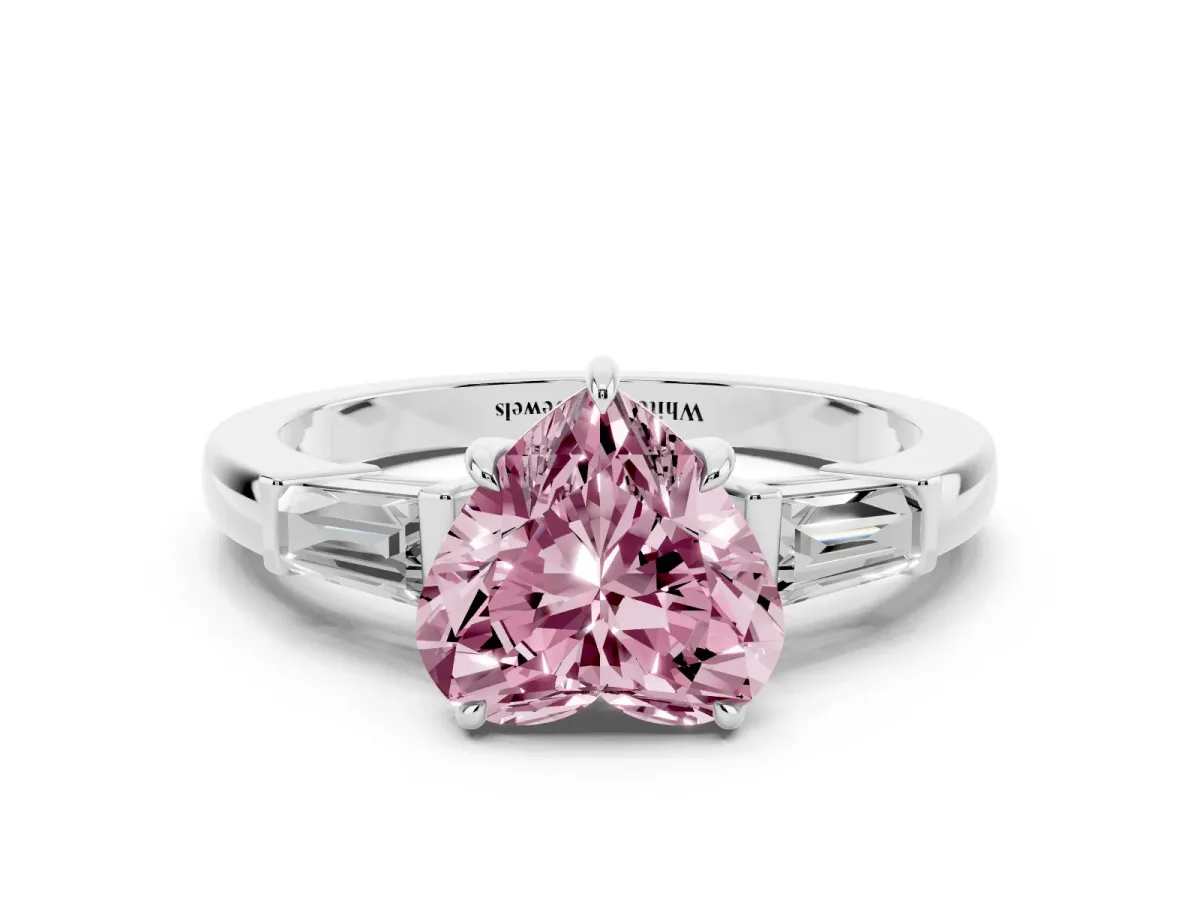 Fancy Pink Heart Cut Diamond Three-Stone Ring with Tapered Baguette Side Stones and Prong Setting Platinum