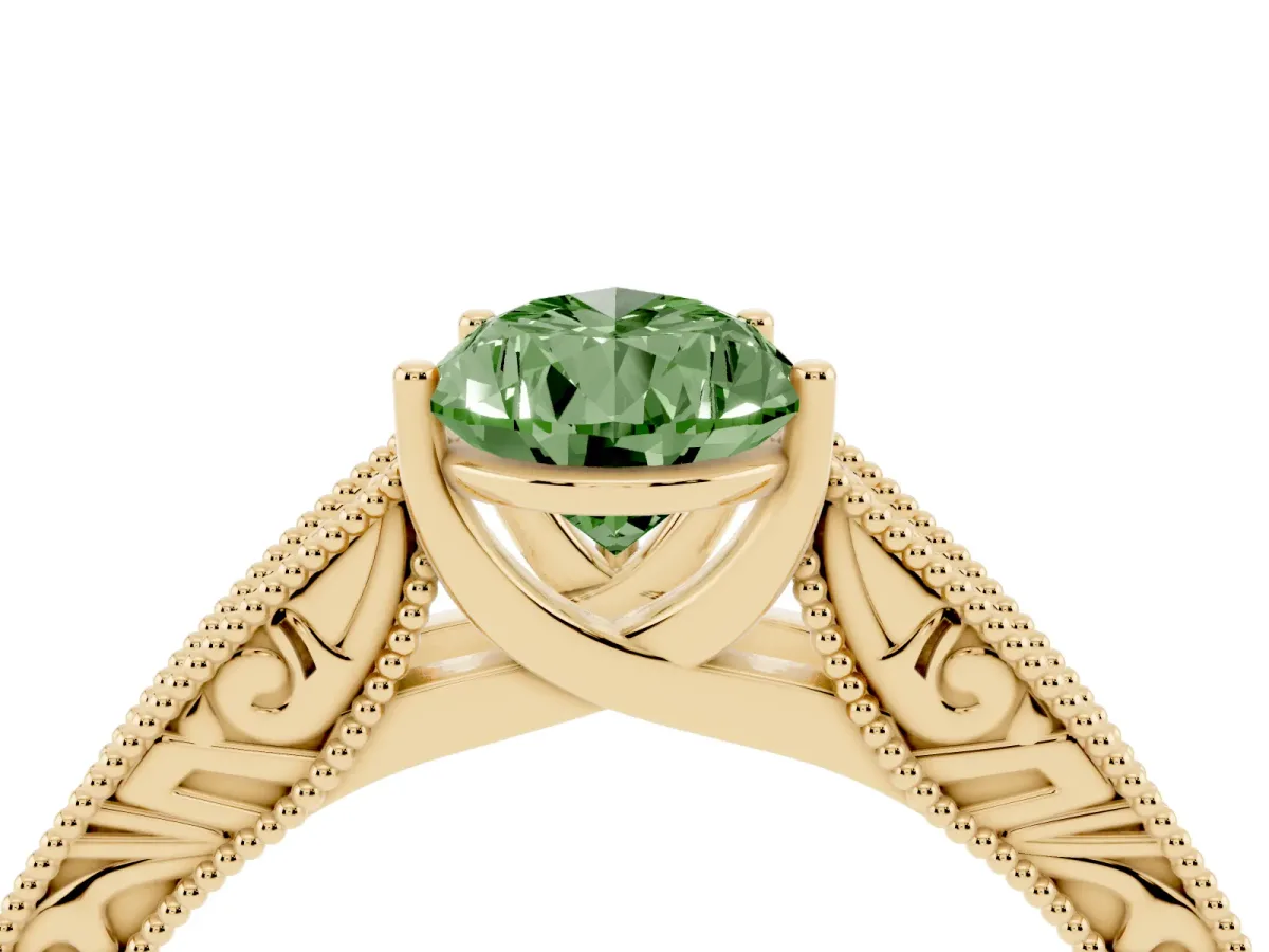 Fancy Green Pear Cut Diamond Solitaire Ring with Engraved Band and Four-Prong Setting Yellow gold