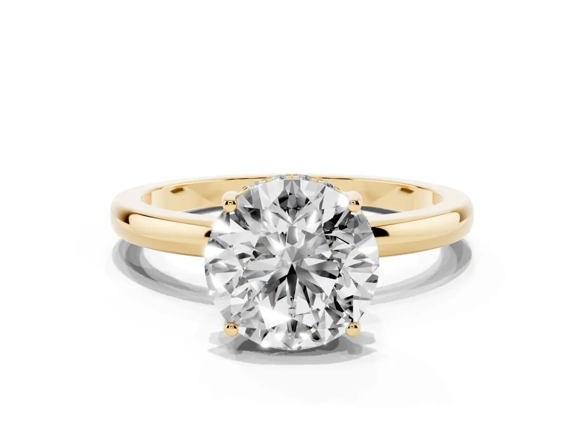 Round Cut Solitaire Diamond Ring with Prong Setting and Plain Band Yellow gold
