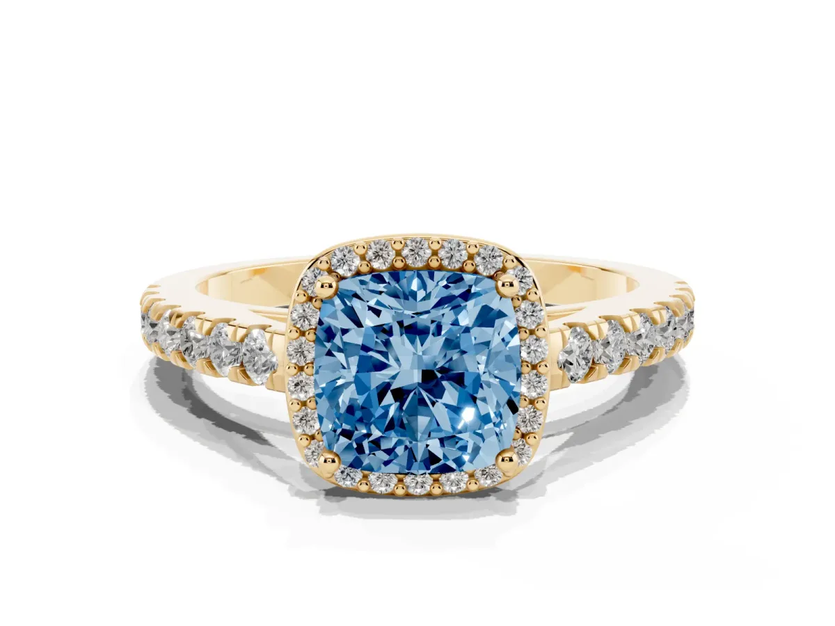 Fancy Blue Cushion Cut Cut Halo Diamond Engagement Ring with Pave Band and Four-Prong Setting Yellow gold