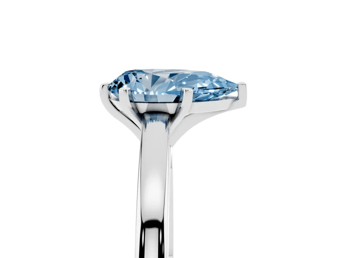 Fancy Blue Pear Cut Solitaire Diamond Engagement Ring with Four-Prong Setting on a Classic Band Silver