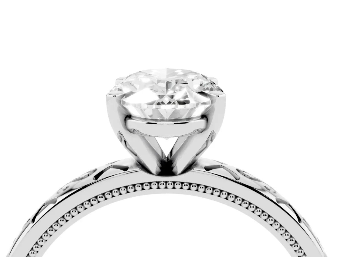Oval Cut Solitaire Engagement Ring with Scrollwork Band and Four-Prong Setting White gold