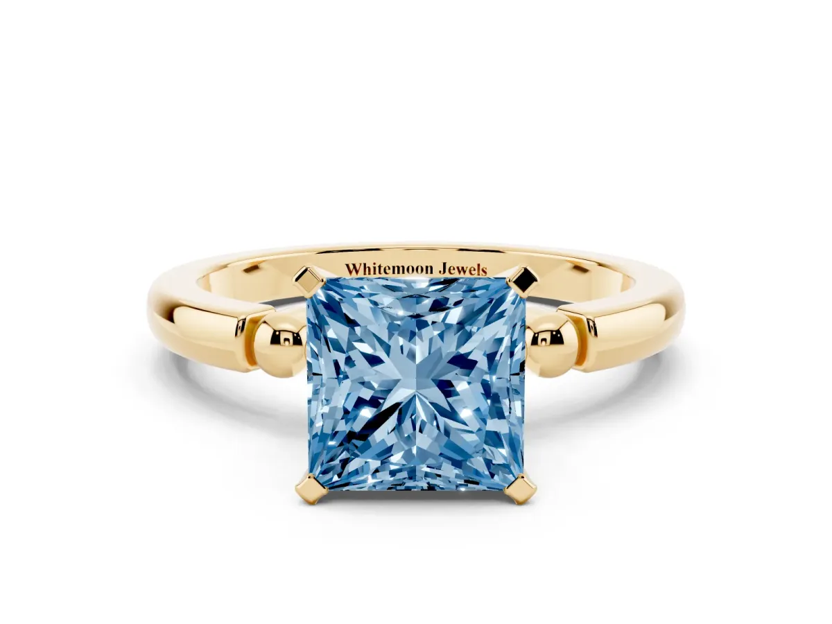 Fancy Blue Princess Cut Solitaire Beaded Band with Four-Prong Setting Yellow gold