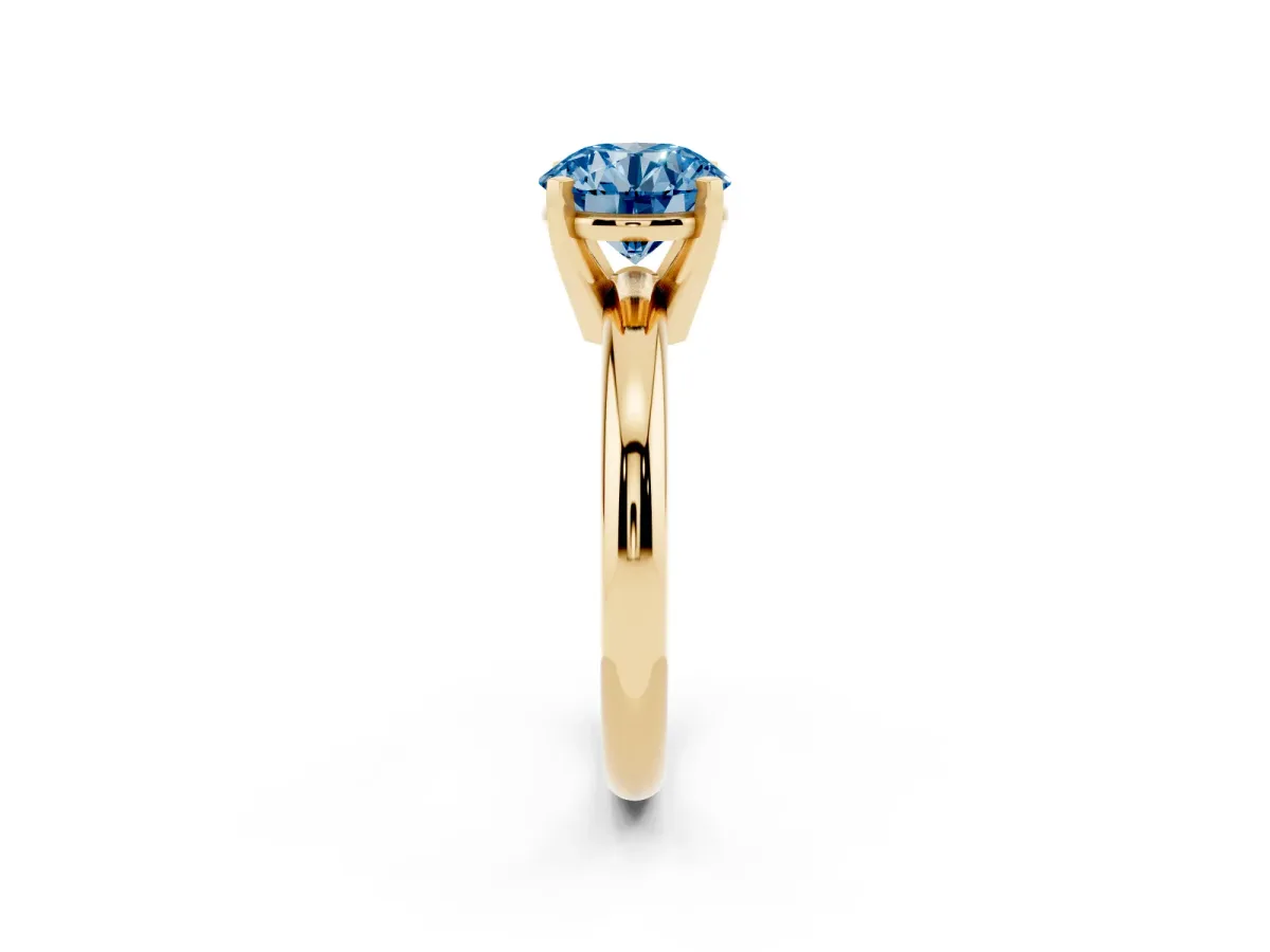 Fancy Blue Round Cut Diamond Solitaire Engagement Ring with Round Band and Four-Prong Setting Yellow gold