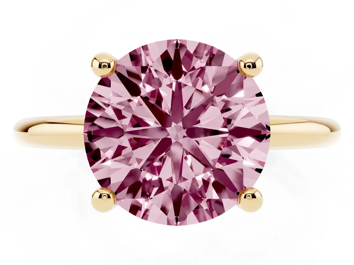 Fancy Pink Round Cut Solitaire Diamond Ring with 4-Prong Setting on a Classic Band Yellow gold