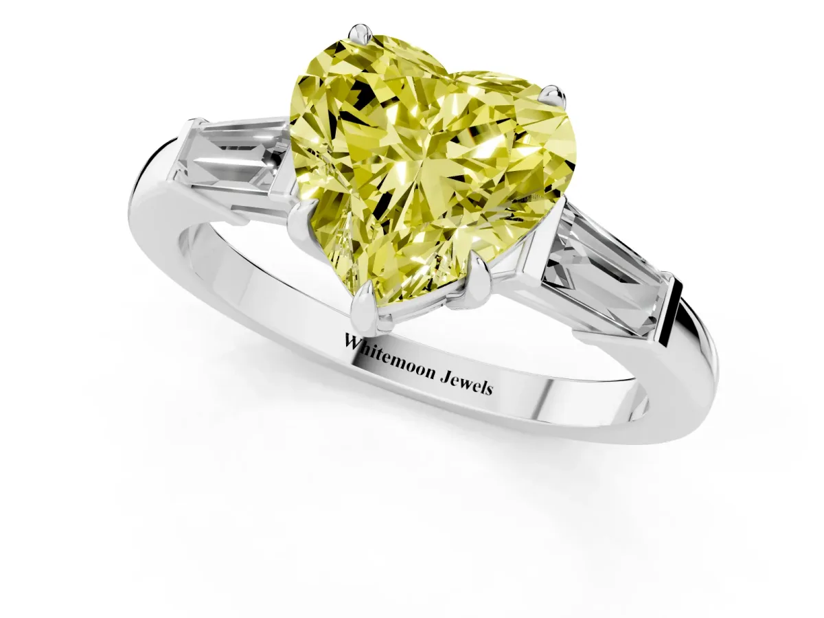 Fancy Yellow Heart Cut Diamond Three-Stone Ring with Tapered Baguette Side Stones and Prong Setting White gold