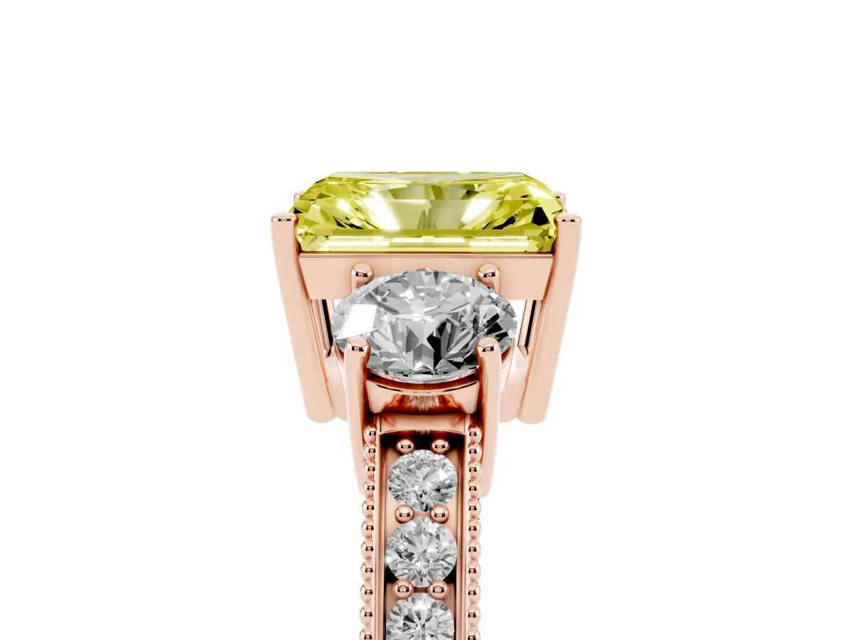 Fancy Yellow Radiant Cut Three-Stone Diamond Ring with Pavé Band and Four-Prong Setting Rose gold