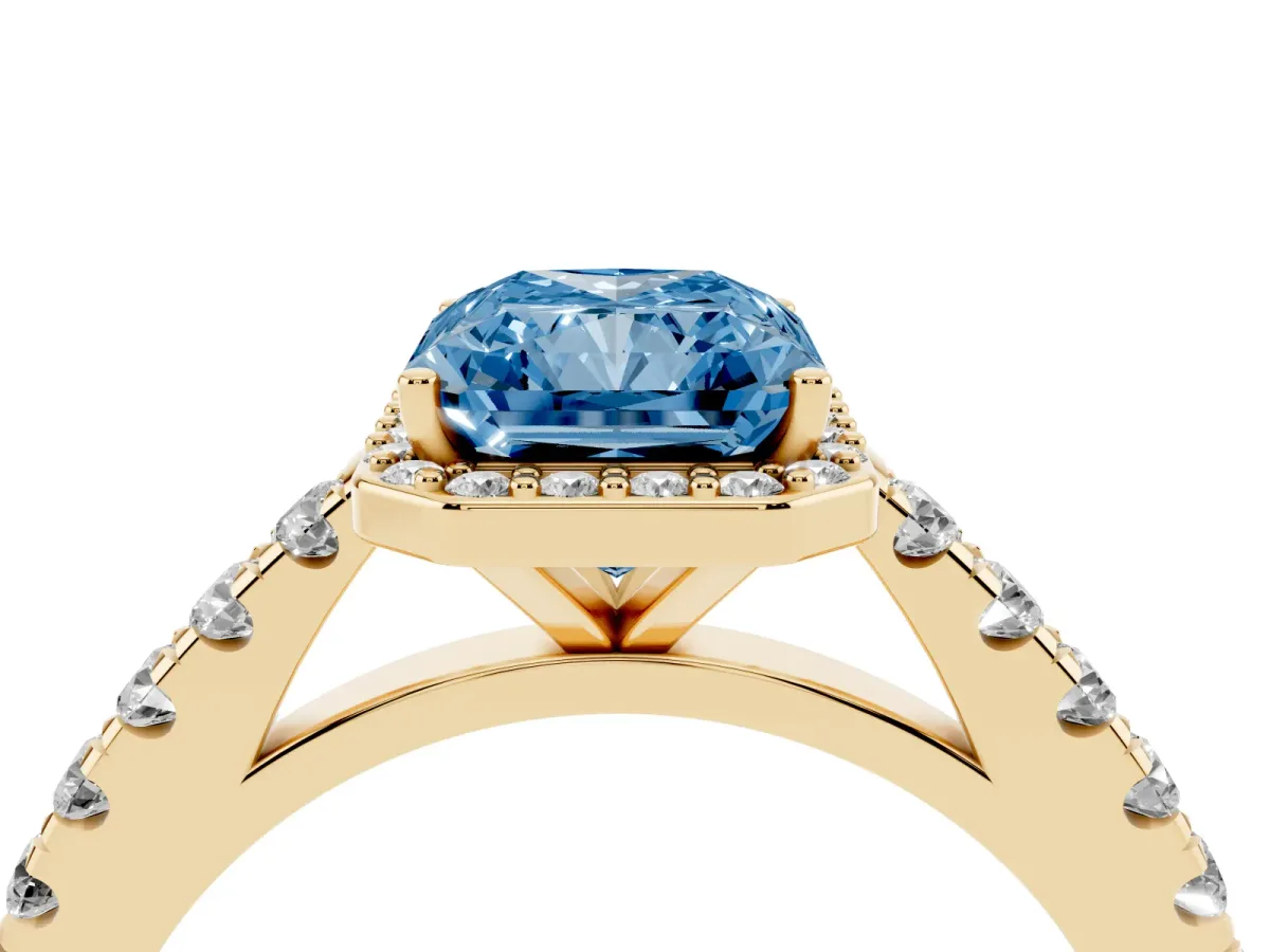 Fancy Blue Radiant Cut Cut Halo Diamond Engagement Ring with Pave Band and Four-Prong Setting Yellow gold