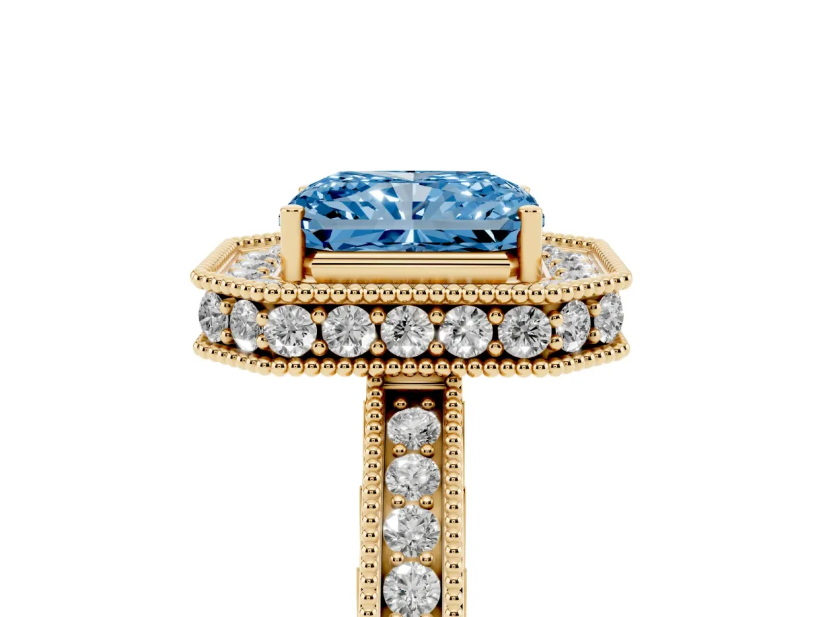 Fancy Blue Radiant Cut Diamond Milgrain Halo Engagement Ring with Round Pavé Band and Prong Setting Yellow gold