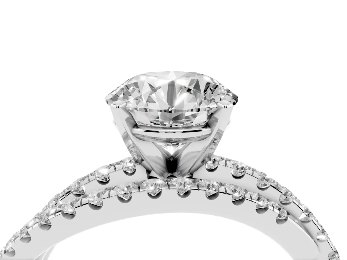 Round Cut Solitaire Twist Band with Pavé Setting and Four-Prong Setting Silver