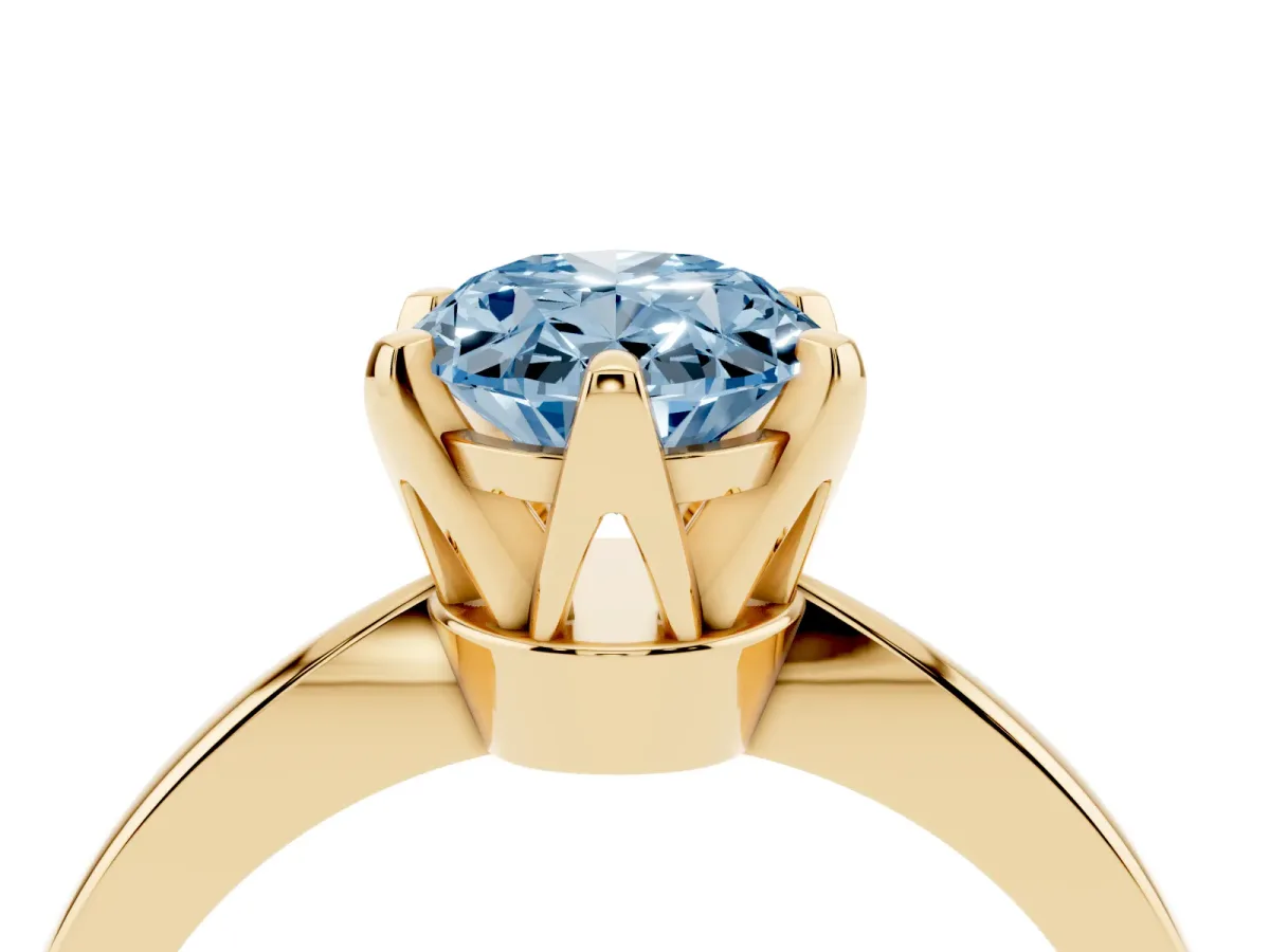 Fancy Blue Oval Cut Solitaire Engagement Ring with Six-Prong Setting and Tapered Band Yellow gold