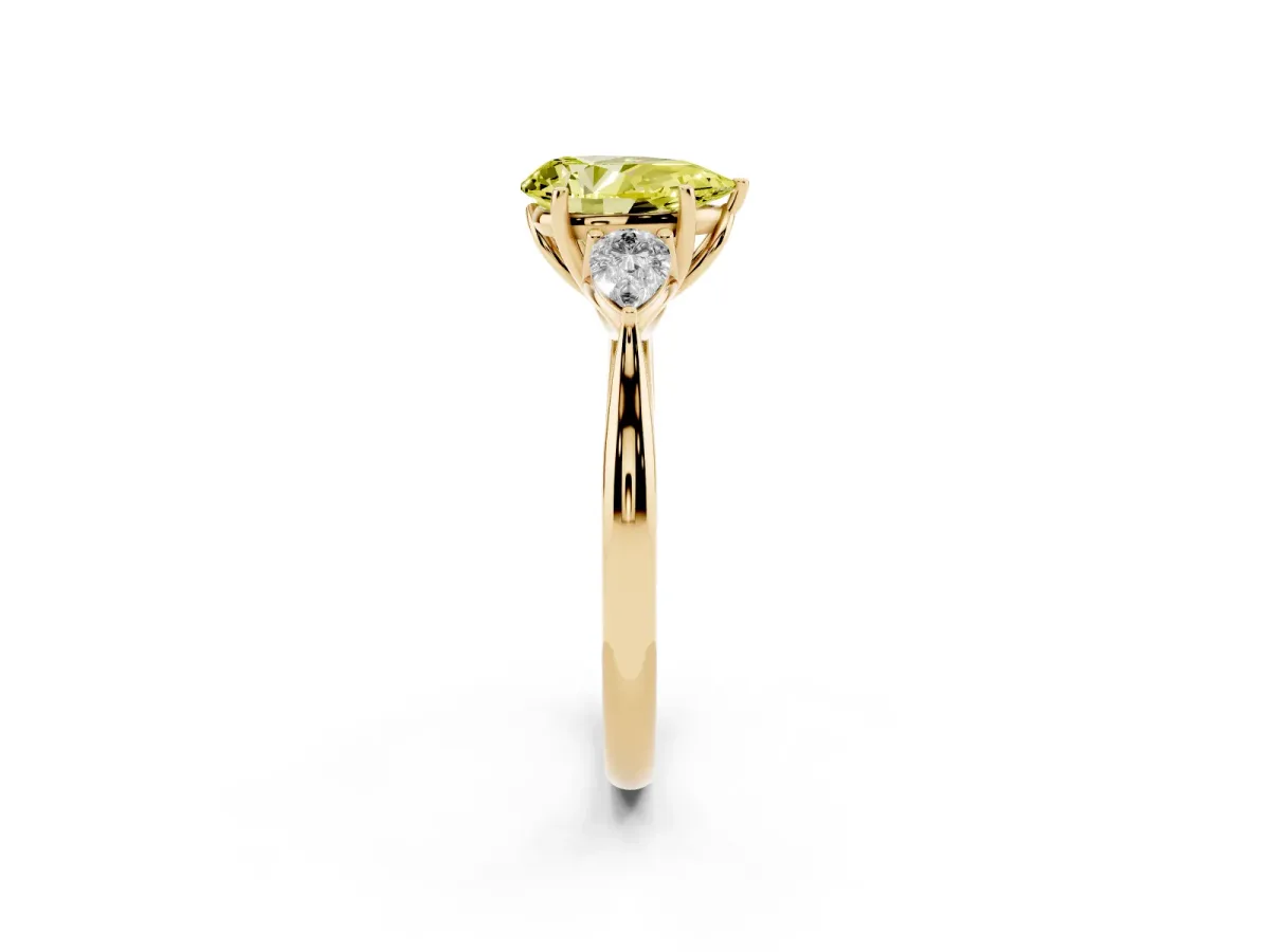 Fancy Yellow Three-Stone Pear Cut Brilliant Diamond Solitaire Ring with Tapered Band and Four-Prong Setting Yellow gold