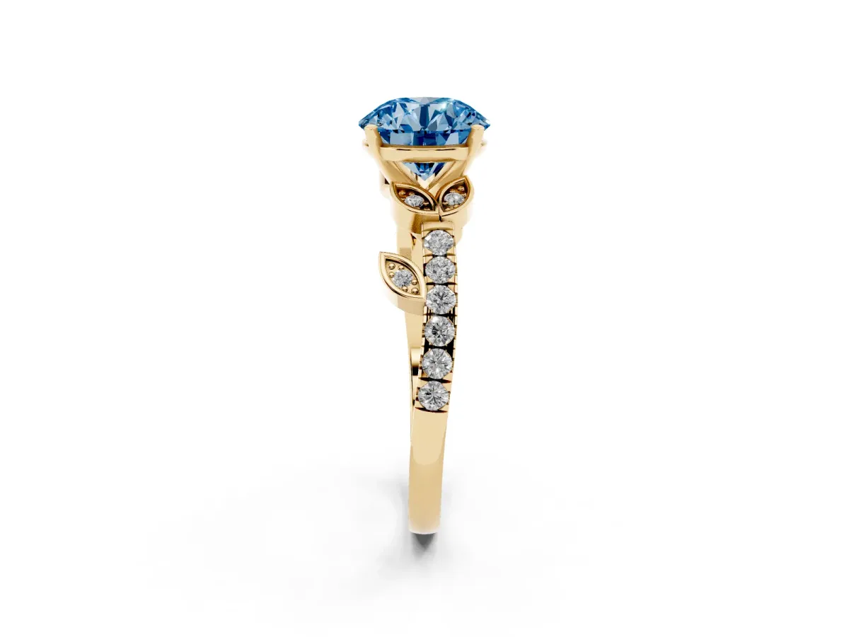 Fancy Blue Round Cut Solitaire Leaf-Inspired Diamond Ring with Pavé Band and Four-Prong Setting Yellow gold