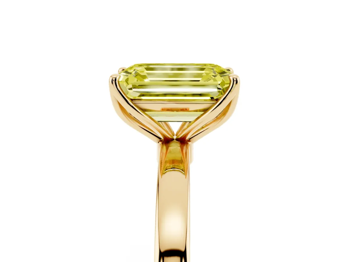 Fancy Yellow Emerald Cut Diamond Solitaire Ring with Thin Band and Prong Setting Yellow gold