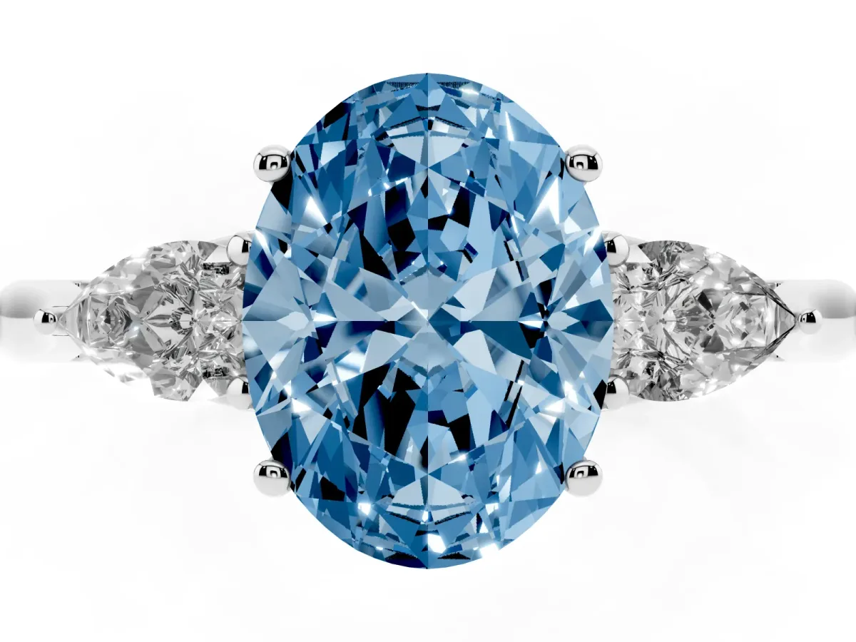 Fancy Blue Oval Cut Diamond Three-Stone Ring with Pear Side Stones and Prong Setting White gold