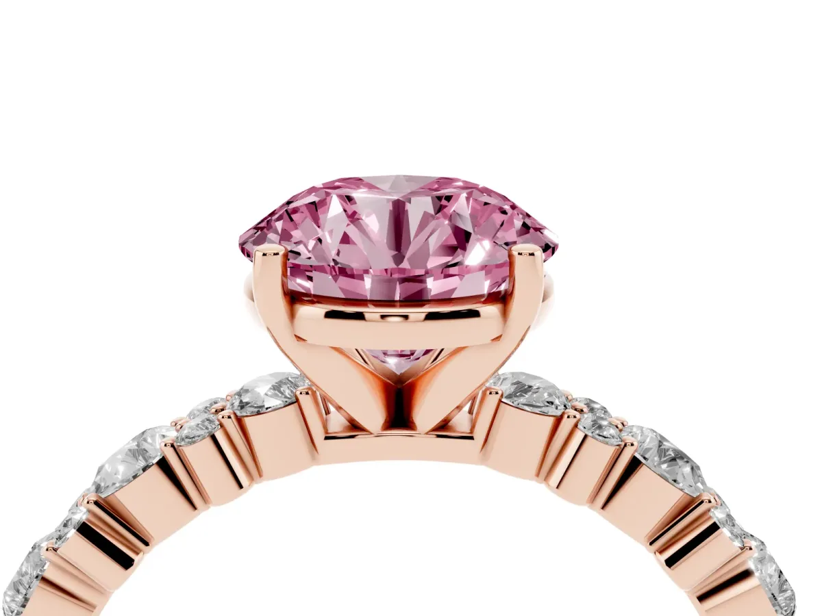 Fancy Pink Round Cut Diamond Side Stone Solitaire Ring with Round and Four-Prong Setting Rose gold