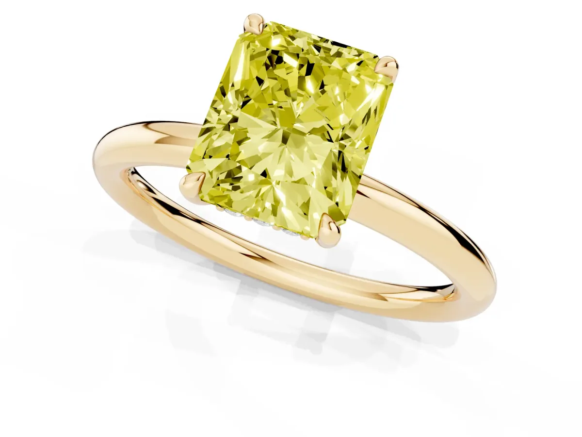 Fancy Yellow Radiant Cut Diamond Solitaire Ring with Thin Band and Four-Prong Setting Yellow gold