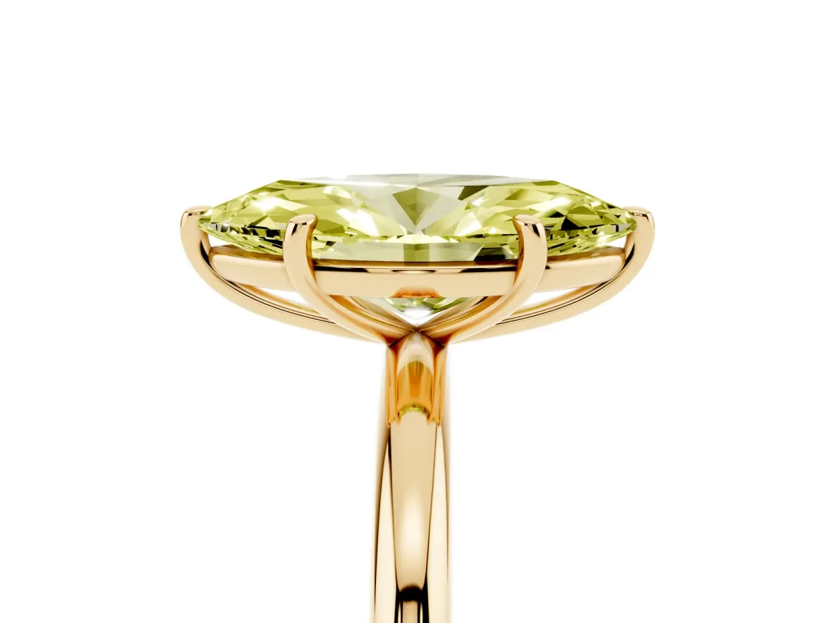 Fancy Yellow Marquise Cut Solitaire Diamond Ring with Four-Prong Setting on a Plain Band Yellow gold