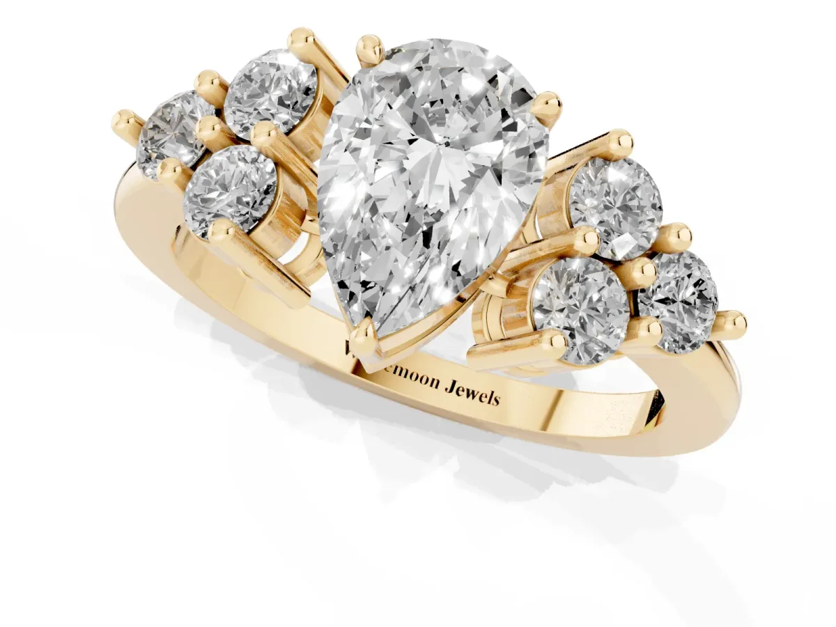 Pear Cut Brilliant Diamond Cluster Accent Solitaire Ring with Prong Setting Yellow gold