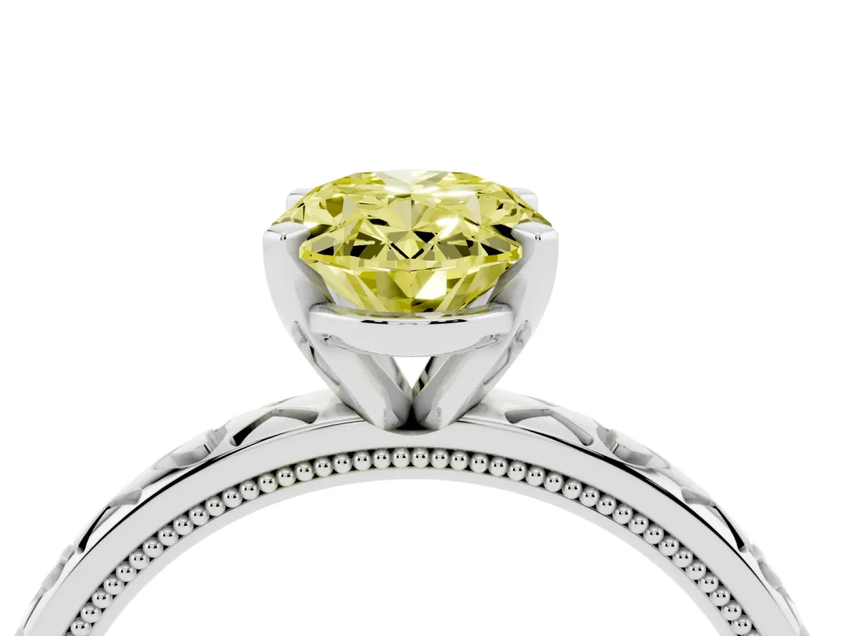 Fancy Yellow Oval Cut Solitaire Diamond Engagement Ring with XO Engraved Band and Four-Prong Setting Platinum