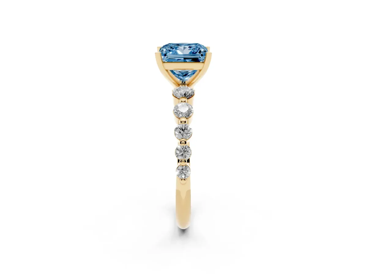 Fancy Blue Princess Cut Solitaire Diamond Ring with Pave Band and Four-Prong Setting Yellow gold