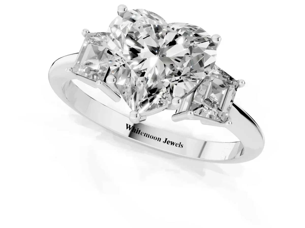 Heart Cut Diamond Three-Stone Ring with Trapezoid Side Stones and Prong Setting Platinum