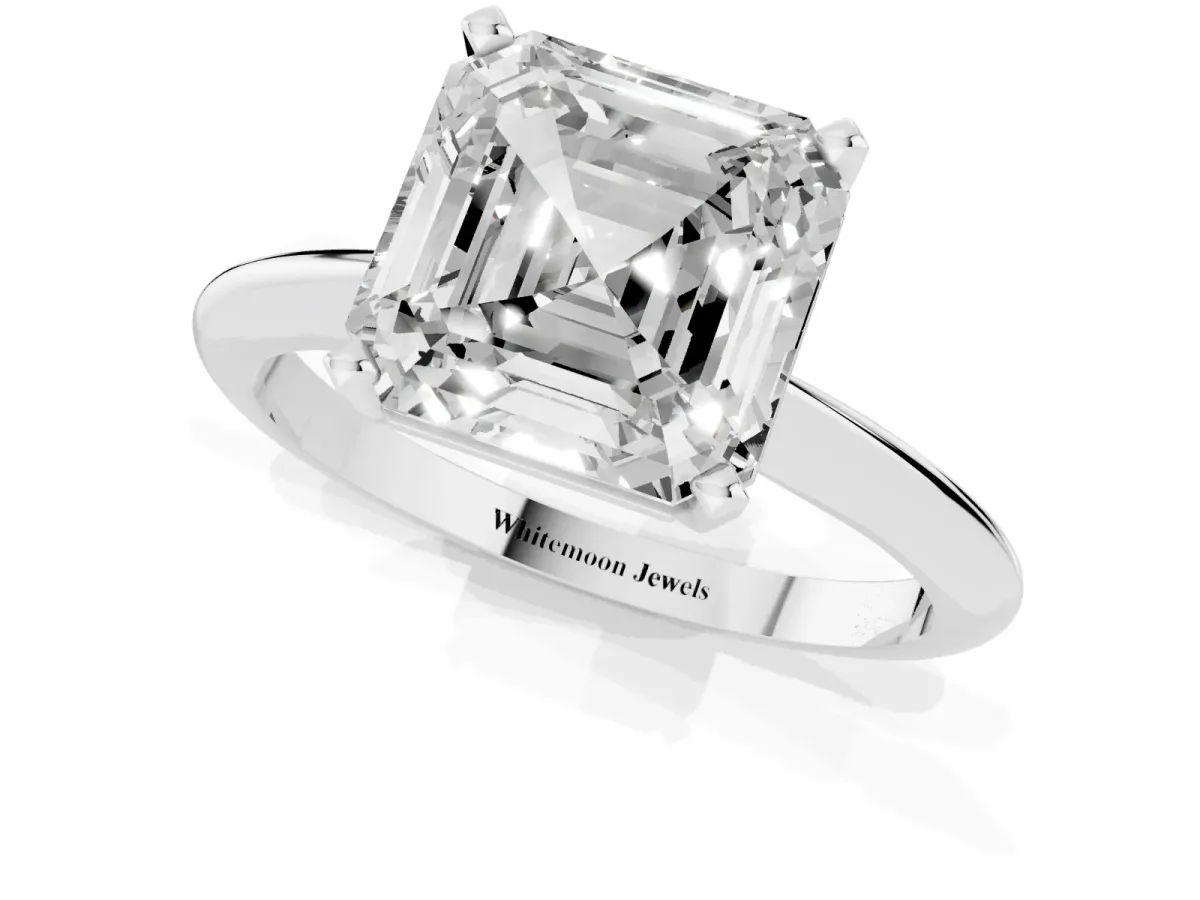 Asscher Cut Cut Solitaire Ring with Four-Prong Setting on a Classic Band Silver