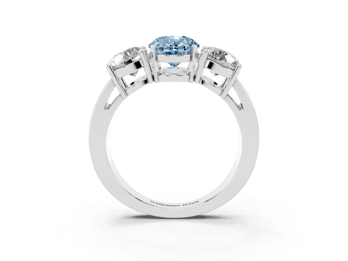 Fancy Blue Three-Stone Oval Cut Diamond Ring with Round Side Stones, Classic Band, and Four-Prong Setting White gold