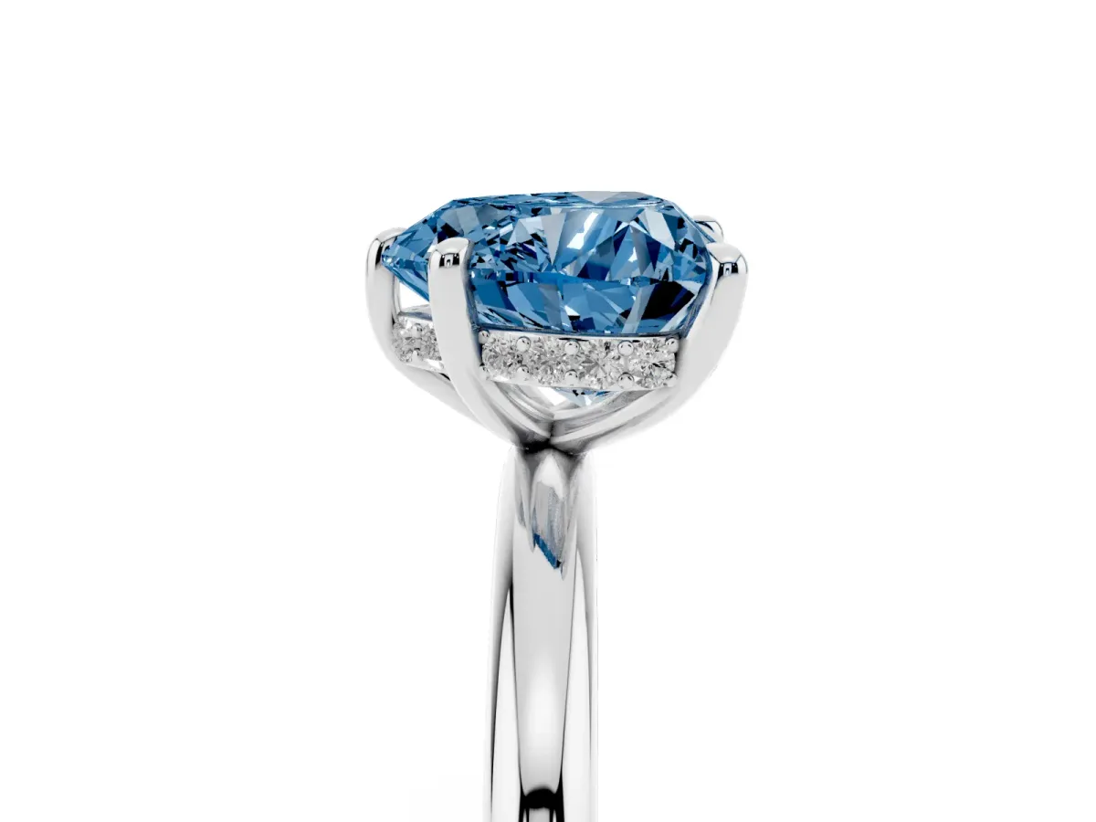 Fancy Blue Heart Cut Diamond Solitaire Ring with Thin Band and Four-Prong Setting Silver