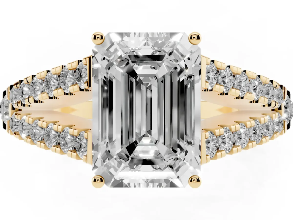 Emerald Cut Diamond Split Shank Engagement Ring with Round Pavé and Prong Setting Yellow gold