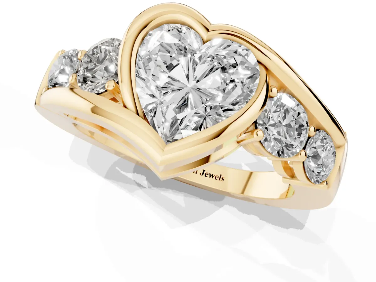 Bezel Set Heart Cut Diamond Bypass Ring with Round Accents Yellow gold