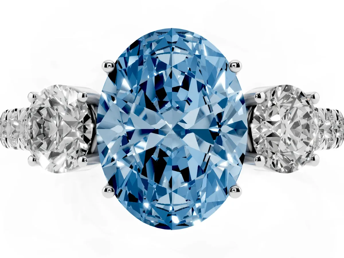 Fancy Blue Oval Cut Cut Diamond Three-Stone Ring with Round Side Stones and Pavé Band Silver
