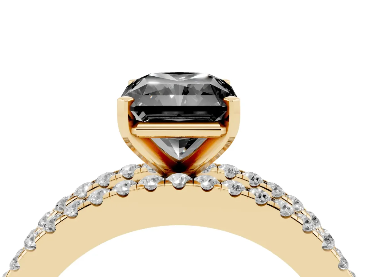 Fancy Black Radiant Cut Diamond Solitaire Ring with Pavé and Channel Set Band Yellow gold