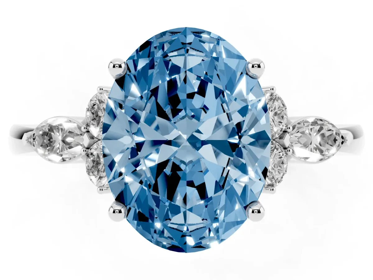 Fancy Blue Oval Cut Brilliant Diamond Solitaire Ring with Pear Side Stones and Four-Prong Setting Silver