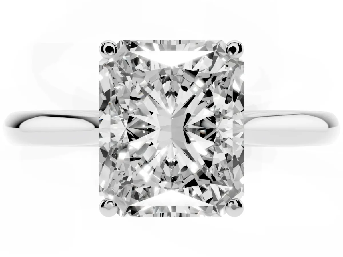 Radiant Cut Cut Solitaire Ring with Cathedral Band and Four-Prong Setting Silver