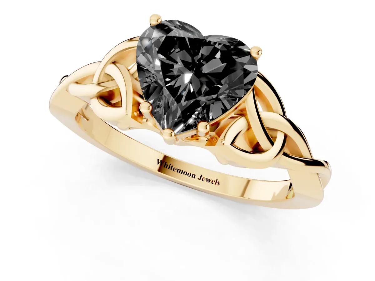 Fancy Black Heart Cut Diamond Solitaire Engagement Ring with Celtic Knot Band and Four-Prong Setting Yellow gold