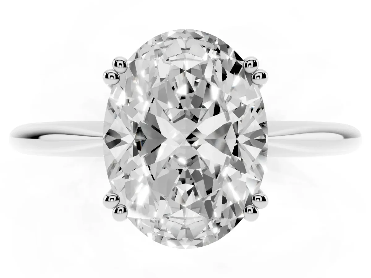 Oval Cut Solitaire Diamond Ring with Six-Prong Setting and Classic Band Silver