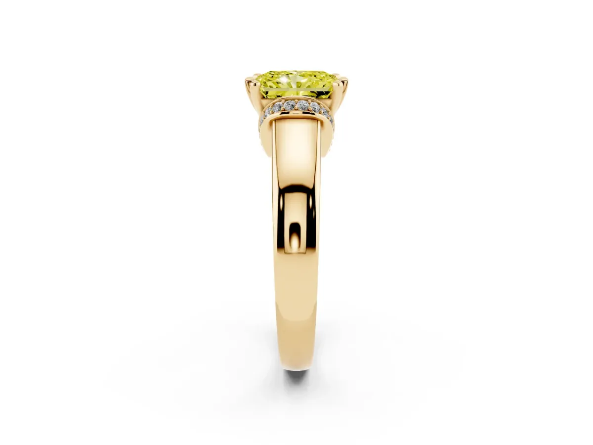 Fancy Yellow Radiant Cut Solitaire Diamond Ring with Pave Band and Six-Prong Setting Yellow gold