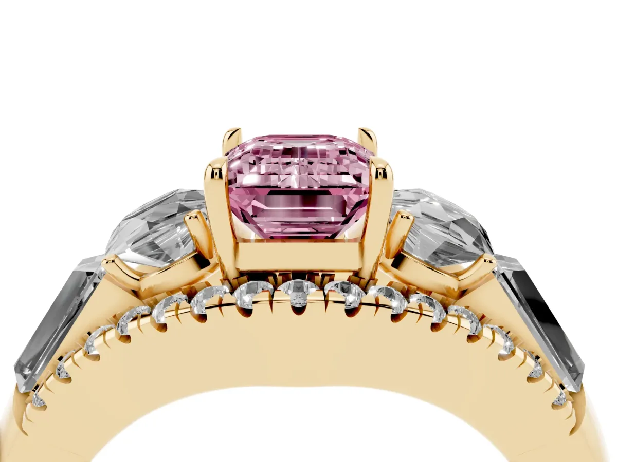 Fancy Pink Three-Stone Emerald Cut Diamond Engagement Ring with Pave Band and Prong Setting Yellow gold